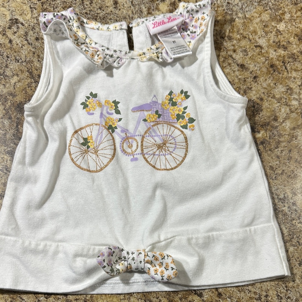 Little Lass Cream Sleeveless Top with Floral Bicycle Design